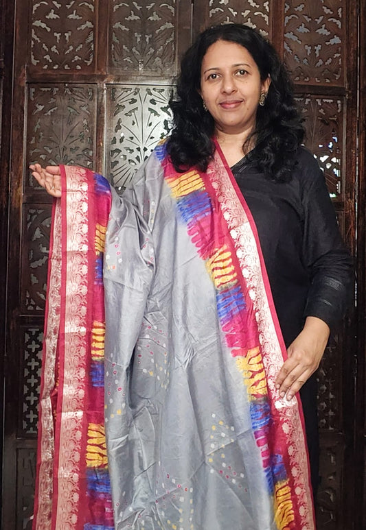 Grey silk bandhni dupatta with pink and silver border